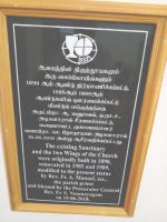 Plaque depicting reconstruction and improvements to Sanctury and the two wings of the Church.